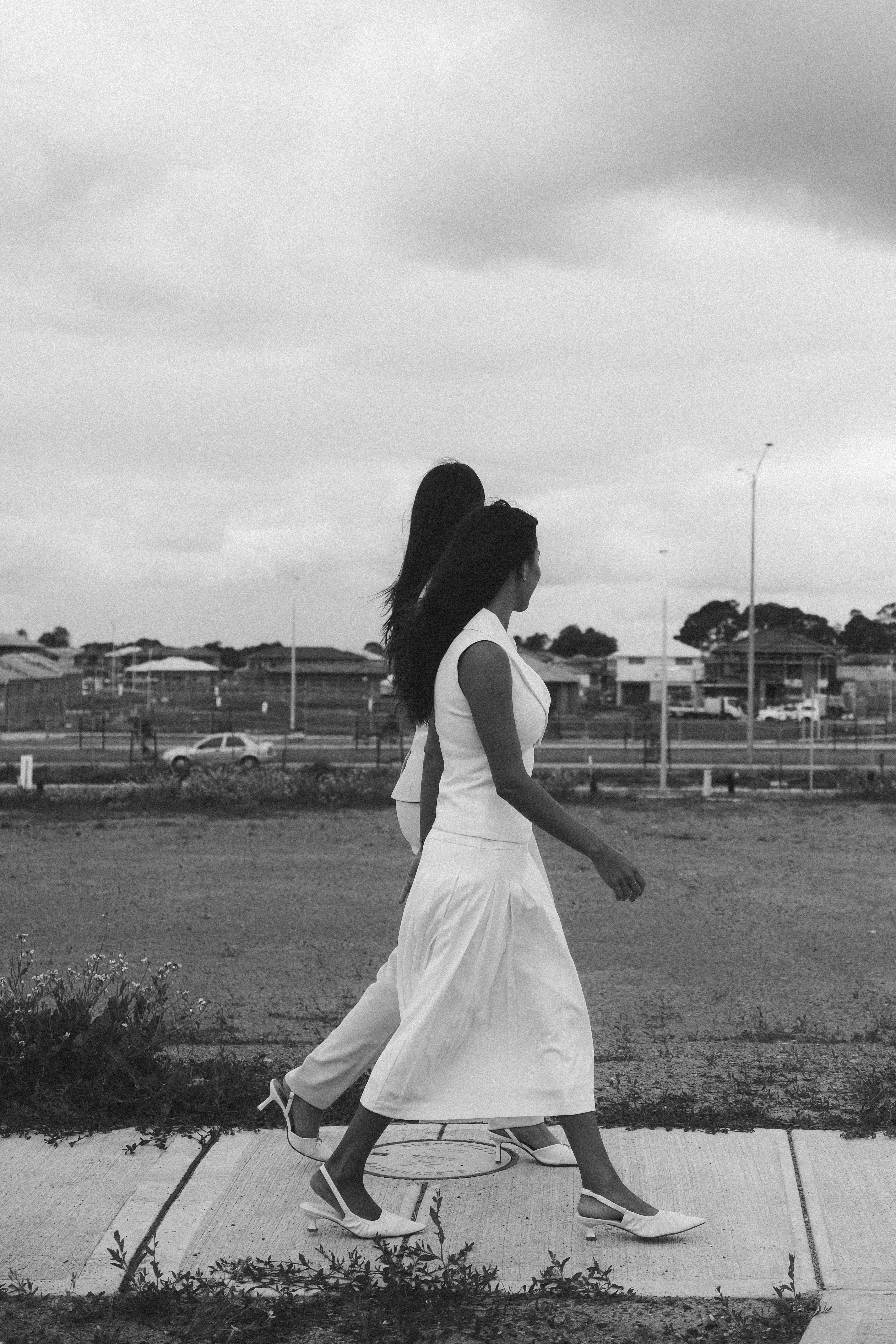 Two Turnkey advisors reviewing land documents at a new-estate lot